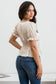 CHAMPAGNE LACE UP PEPLUM  TOP